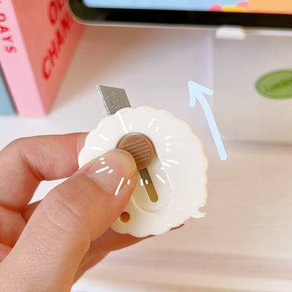 Students Create Flowers With Box Cutters