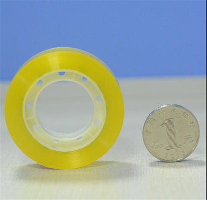 Adhesive transparent stationery tape